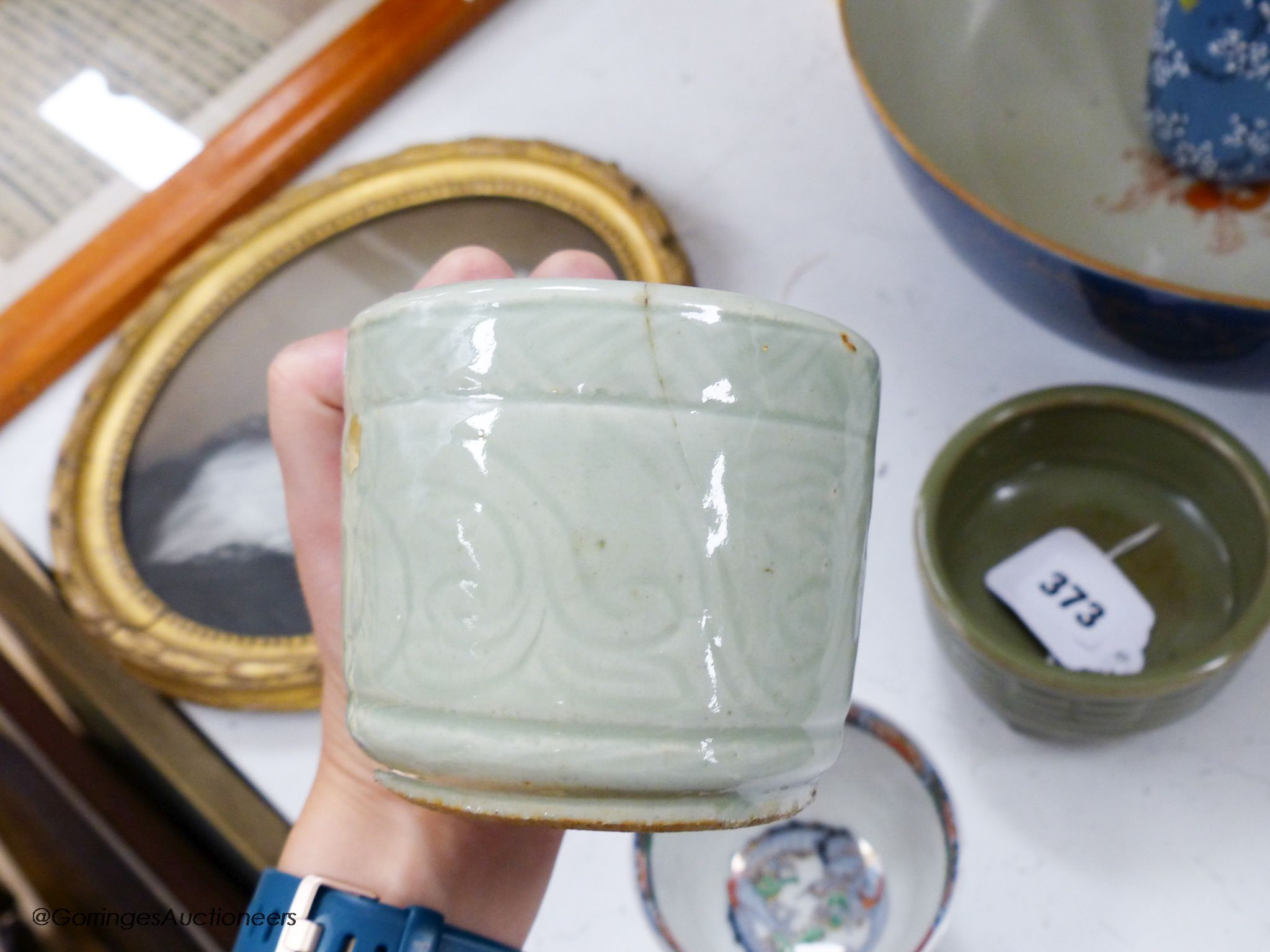 A Chinese prunus sleeve vase, c.1900 two Chinese export bowls, a celadon censer brush pot etc., tallest 31cm